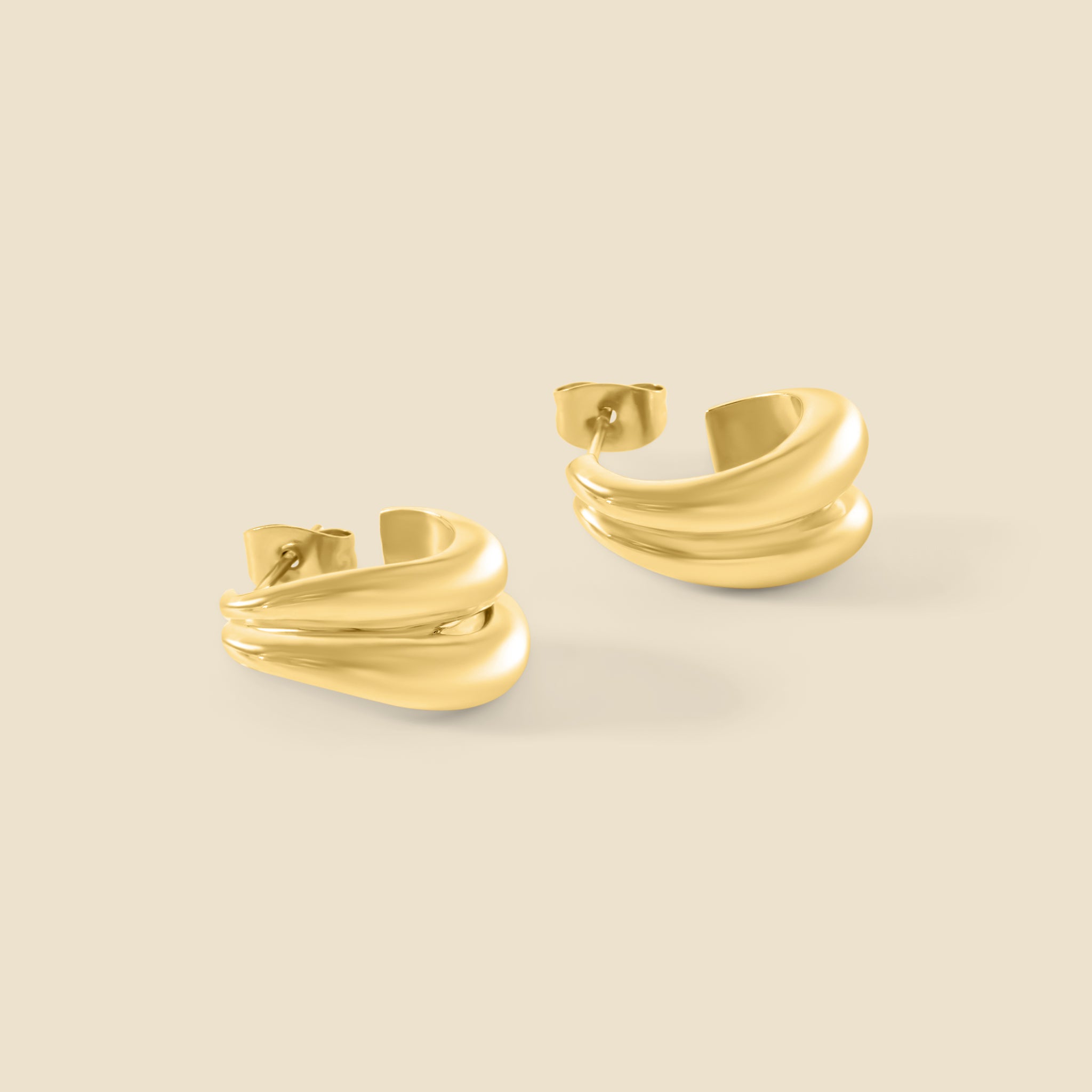 Gold earrings – Charm