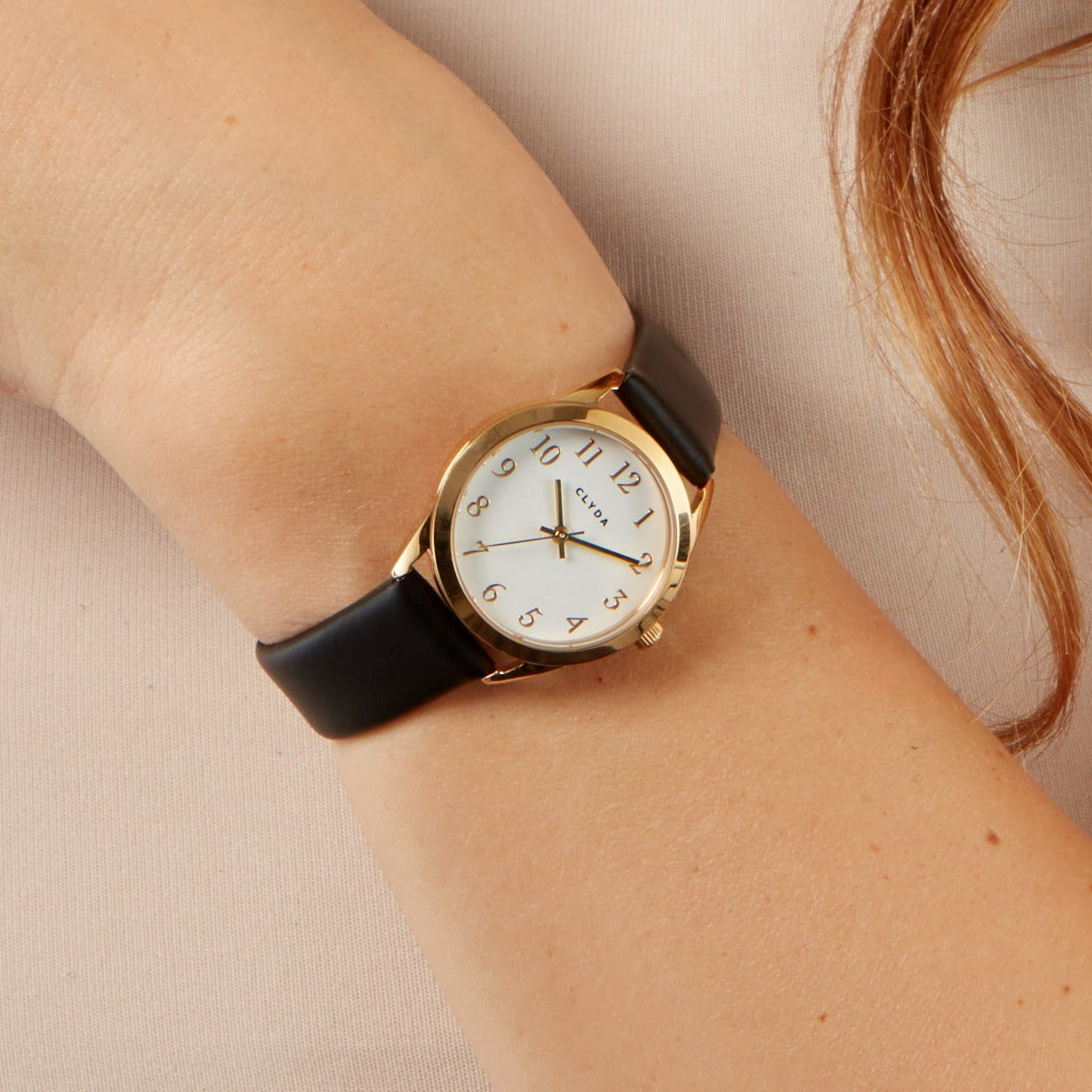 Jeannie gold watch with black leather