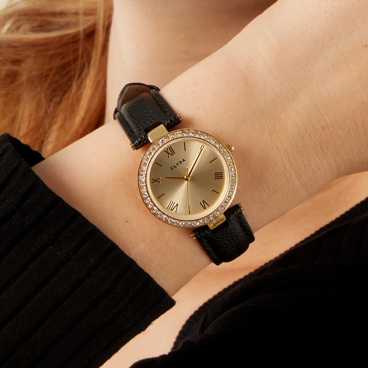 Grenelle gold watch with black leather