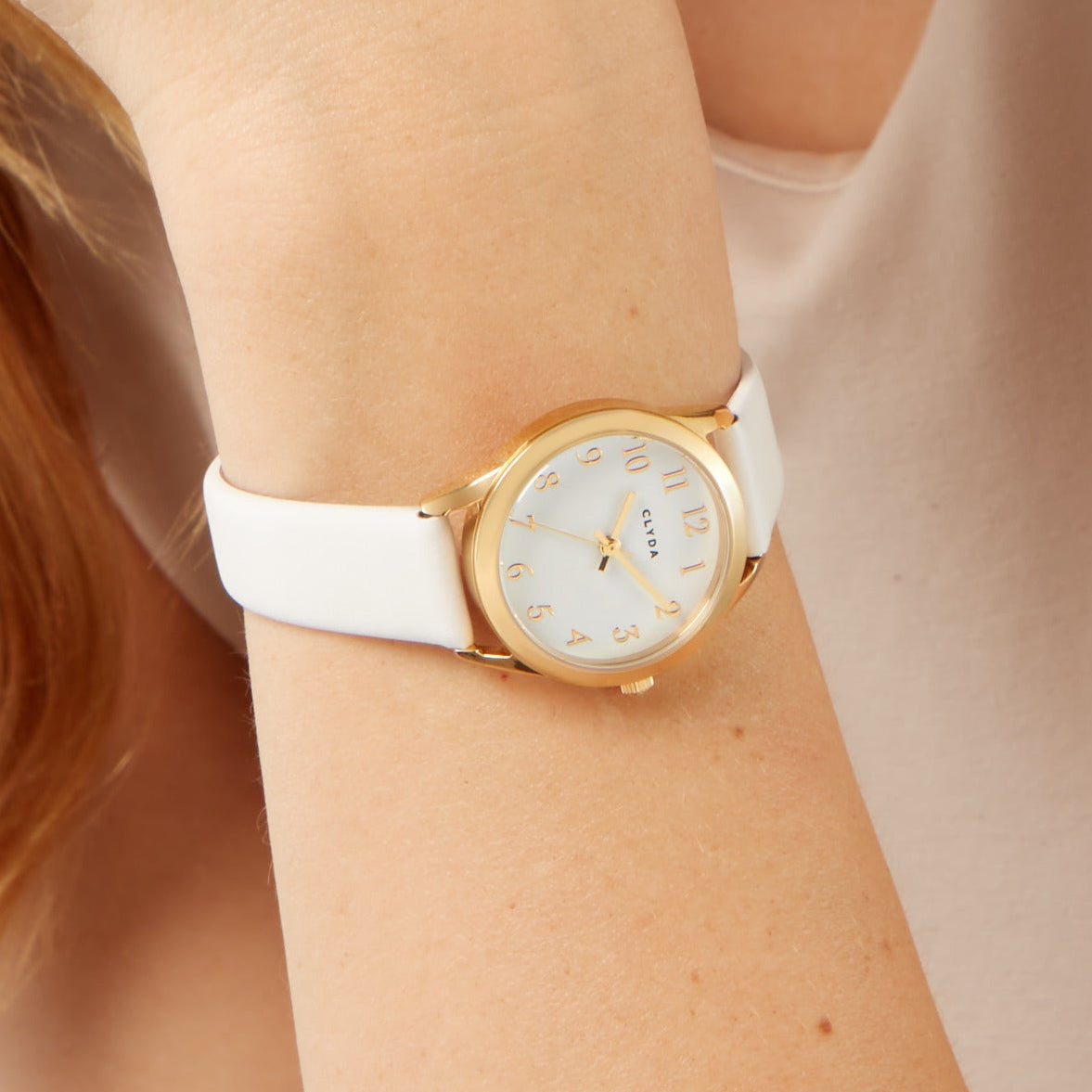 Jeannie gold watch with white leather